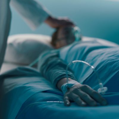 Hospitalized,Patient,Lying,In,A,Hospital,Bed,At,Night,,A